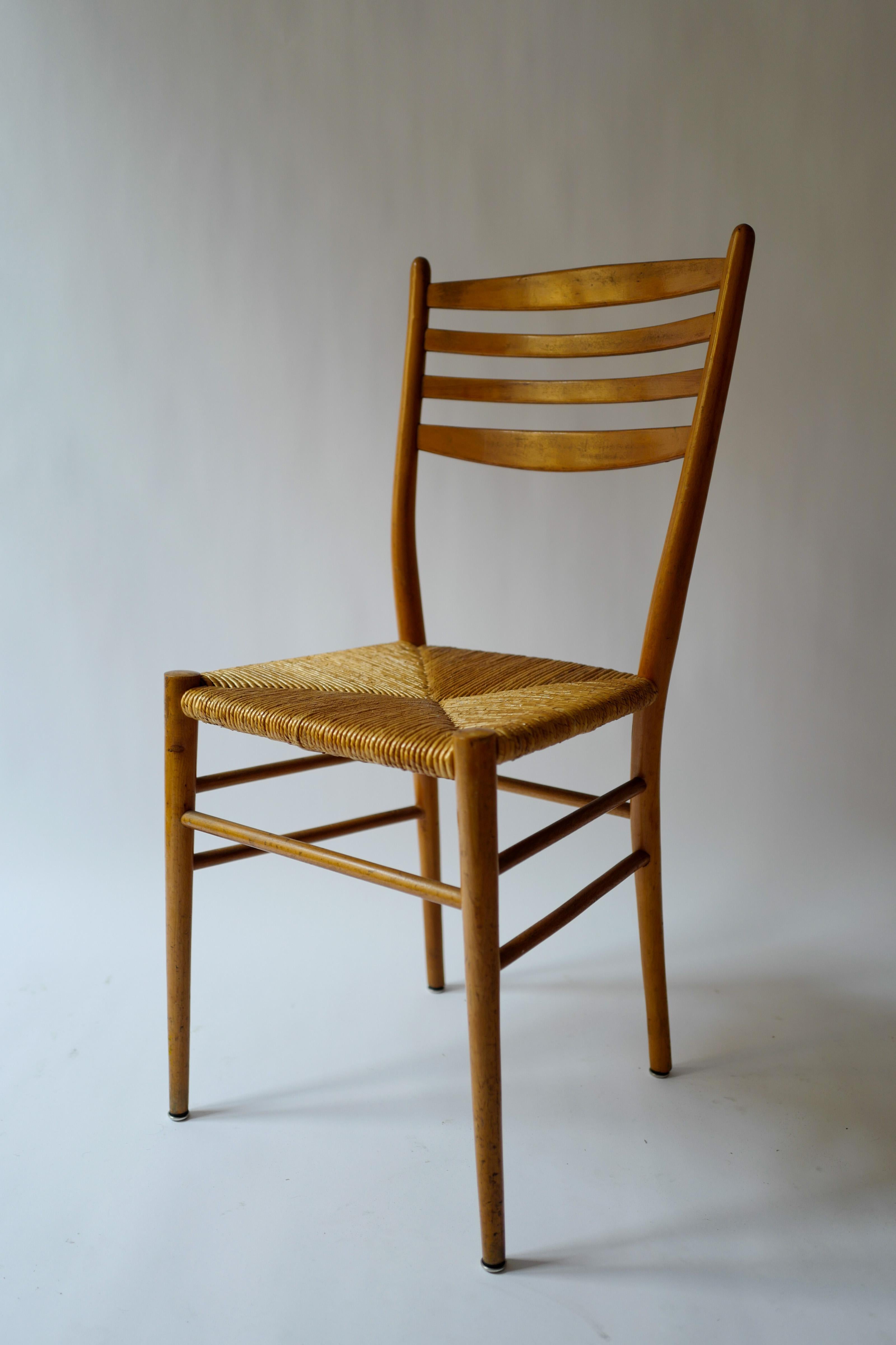 Wood and woven wicker chair in the style of Gio Ponti from Paris, France 1950's.