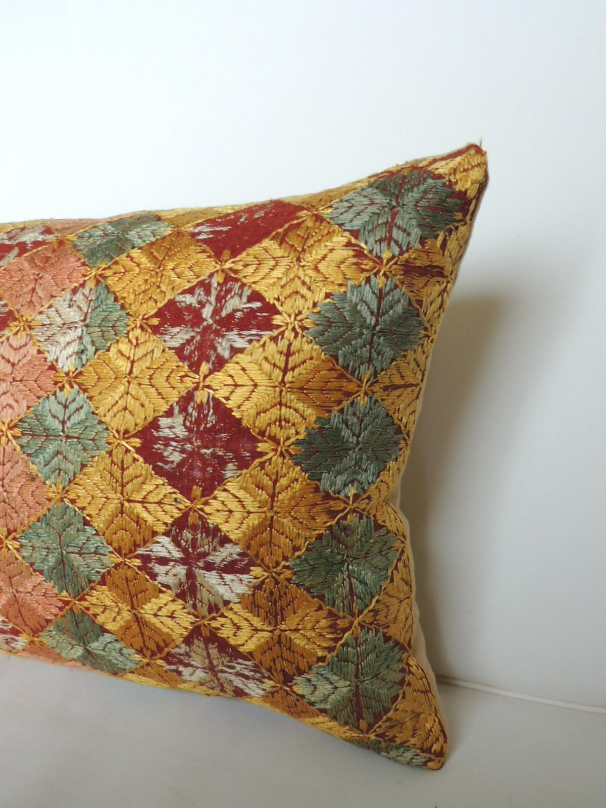 Throw pillow handcrafted with an artisanal Indian Phulkari textile exhibiting a yellow, green and white diamond pattern.
The Phulkari artisanal antique textile was handmade with embroidered silk floss threads stitched onto linen.
Sofy yellow linen