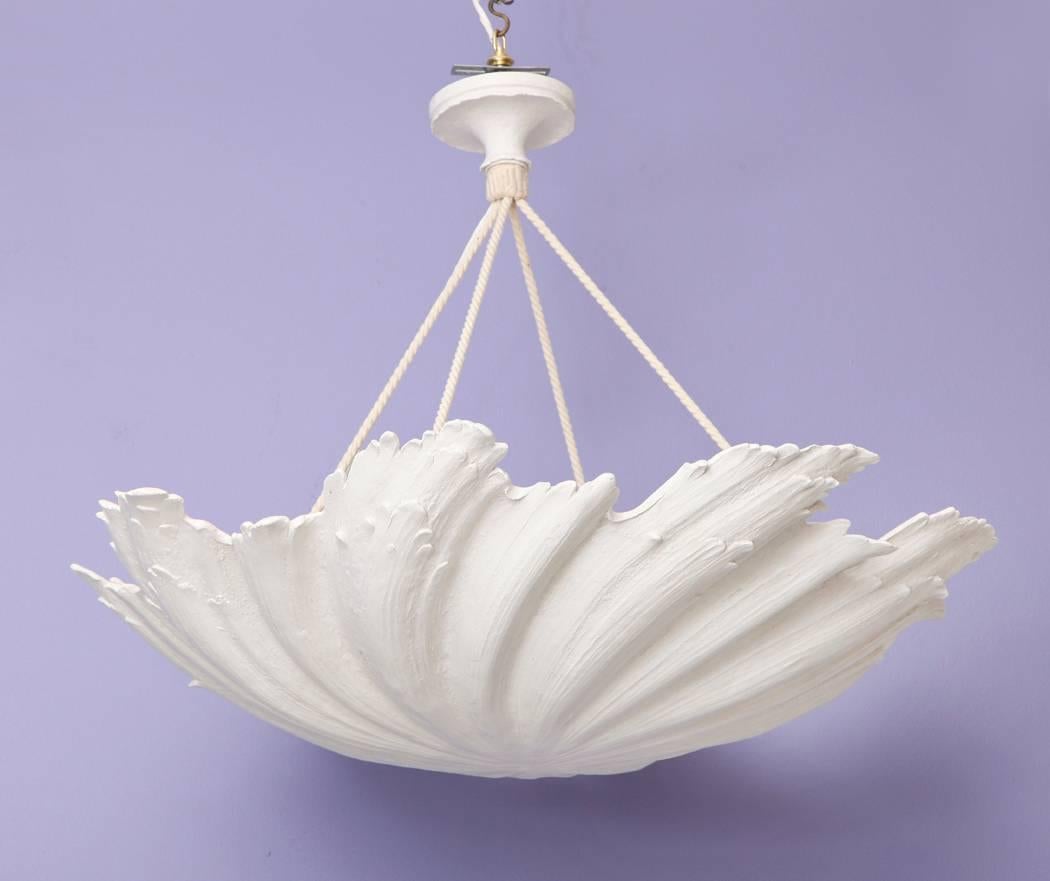 WP Sullivan the shell chandelier
Sculpted shell form chandelier in cast plaster resin.
Hung with twisted ivory cord, you may determine overall drop height. Also, can be suspended from chains or rods. 
Available in several diameters: 18