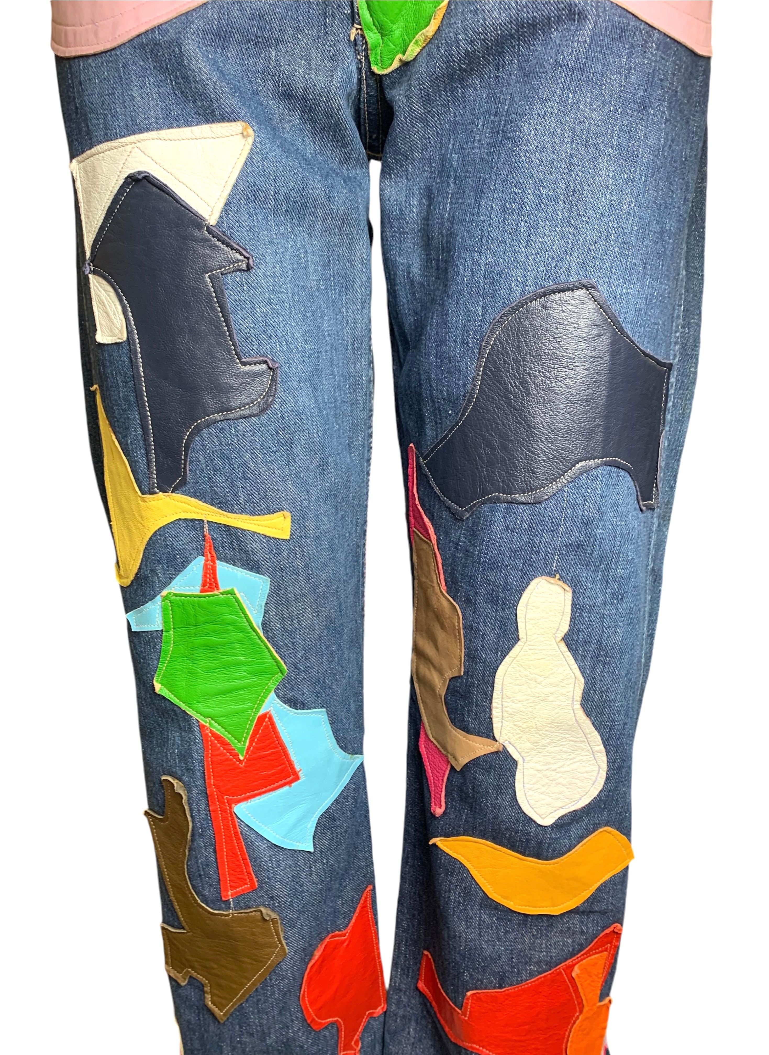 These Wrangler Jeans from the late 1950s and early 1960s served as a blank canvas for the imaginative designer who created this colorful masterpiece. Every detail has been customized, from the patchwork pockets to the flared bells and abstract