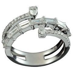 Wrap Around Baguette and Pear Shape Diamond Ring in 18 Karat Gold