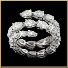 Wrap Around Pear Shape Diamond Ring in 18 Karat Gold