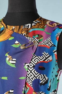 Wrap cocktail printed dress with branded safety pin embellishment Versus Versace