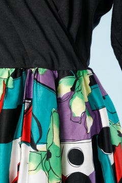 Wrap dress in black cotton jersey and flower printed skirt Jacqueline Lechat