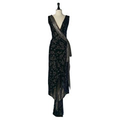 Wrap evening dress with drag in dévoré velvet, lamé and rhinestone brooch
