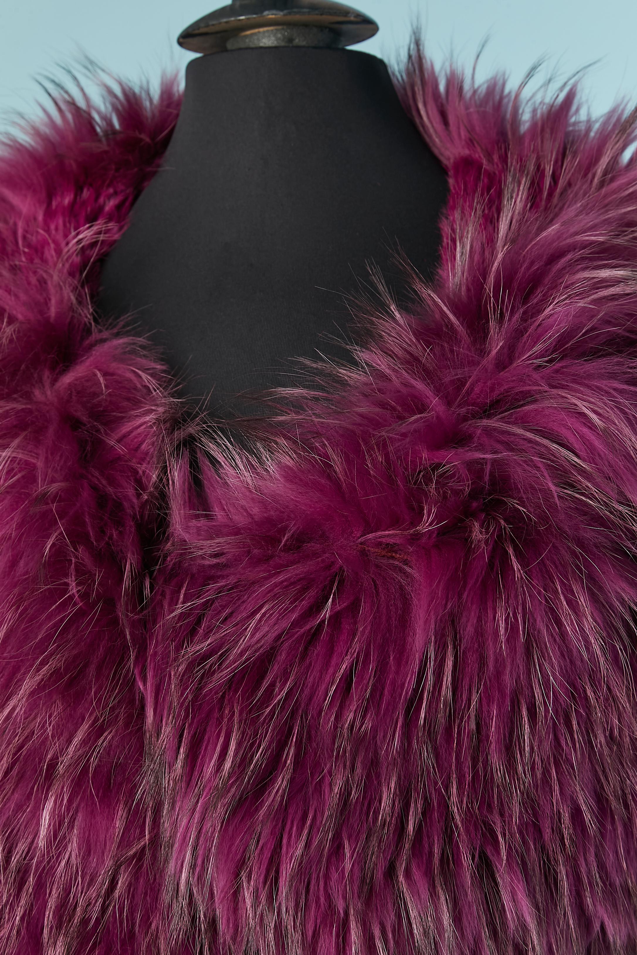 Wrapped Purple knitted fur and leather coat . The short fur is rabbit and the long hair fur is farmed finn raccoon. Leather button closure on the waist.
Pocket on both side. 
SIZE M/L 