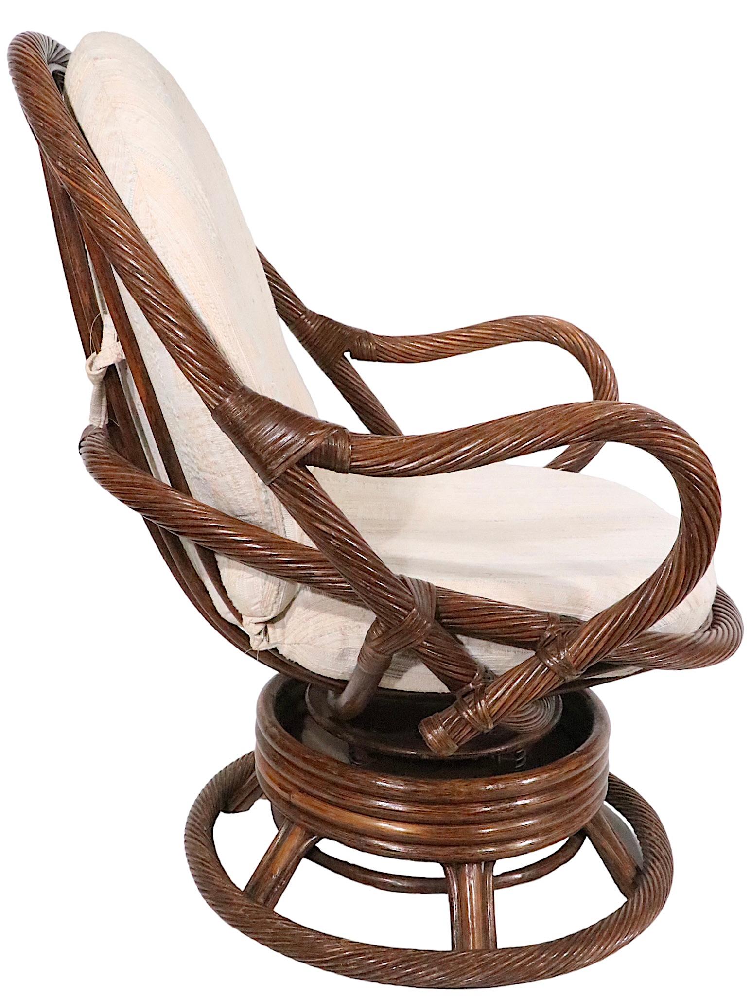 Wrapped Reed and Bamboo Swivel Tilt Lounge Chair c. 1970's In Good Condition For Sale In New York, NY