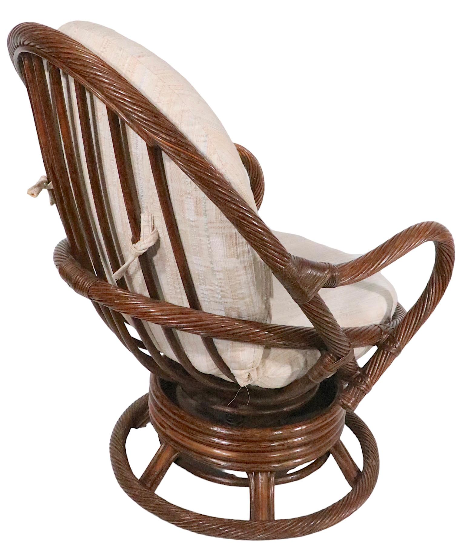 Wrapped Reed and Bamboo Swivel Tilt Lounge Chair c. 1970's In Good Condition For Sale In New York, NY