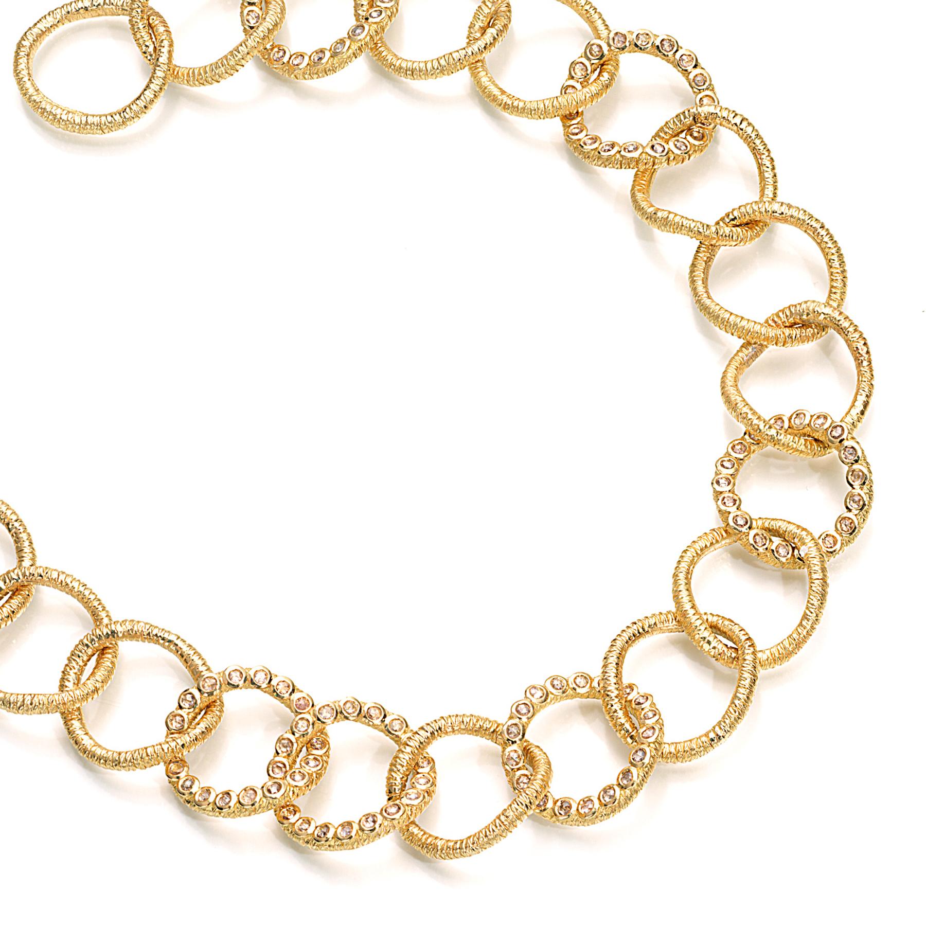 Wrapped Wire Circle Necklace Set in 20 karat Yellow Gold with 3.71-carat Brilliant Diamonds. This is part of COOMI's Eternity Collection which is inspired by the flow of movement through different shapes like circles, wires, and ovals.