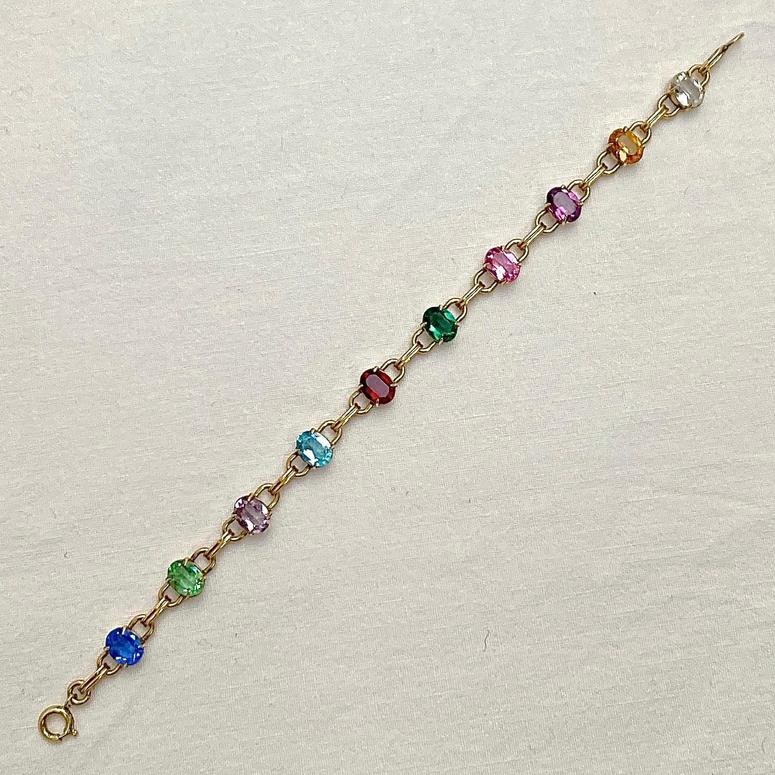 WRE 12K gold filled vintage bracelet, featuring lovely harlequin oval faceted glass links. Length 19.6cm / 7.7 inches by width 7mm / .27 inch. The bracelet is in very good condition. Circa 1950s.

This is a beautiful harlequin link bracelet by