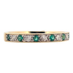 Troglodyte  Anneau en or jaune 10 carats, émeraude et diamants, pierre de naissance de mai