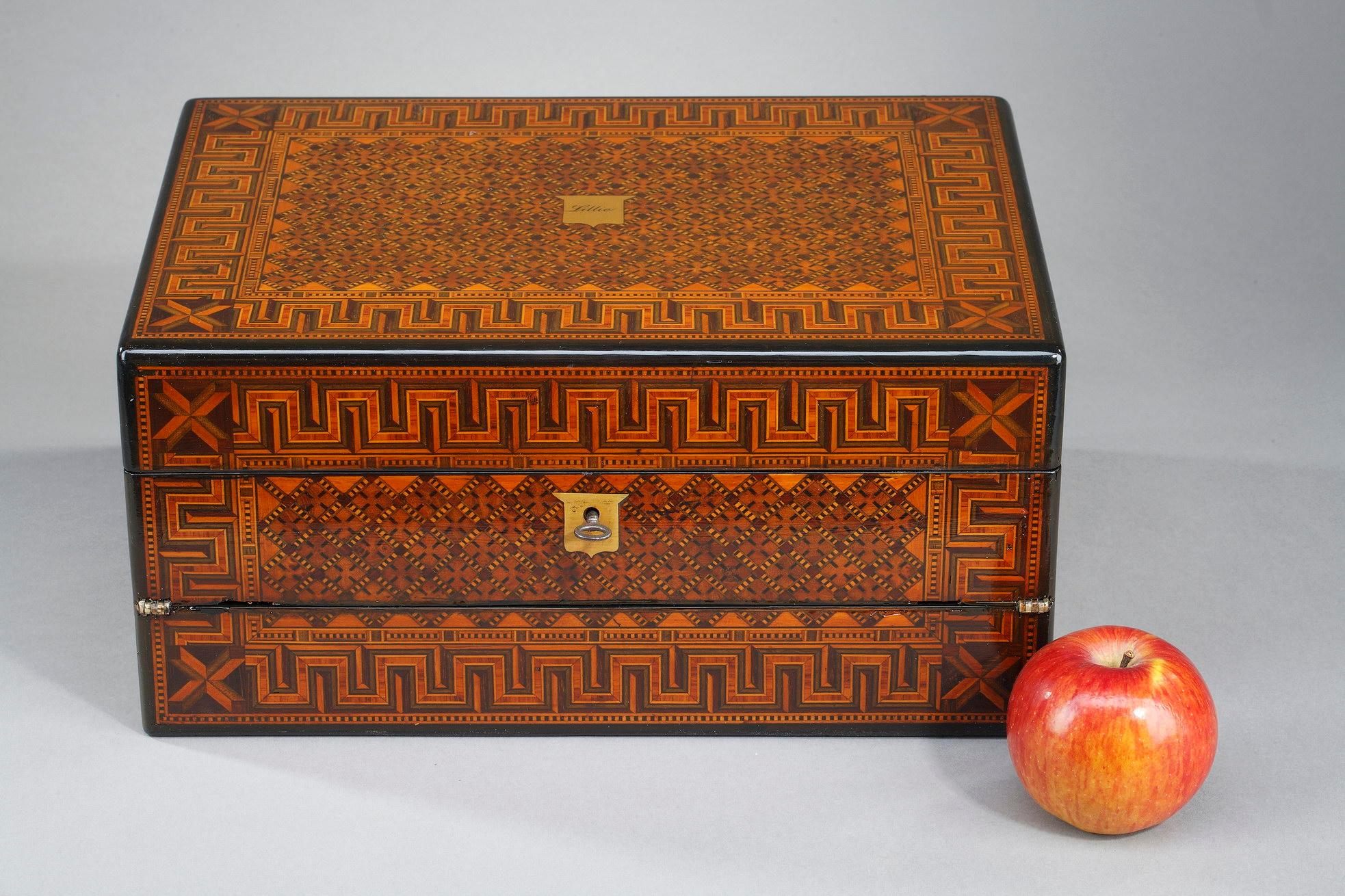 Rectangular box of the XIXth century, with inlaid decoration of crosses in frames of Greek motifs. On the lid is inscribed the name 