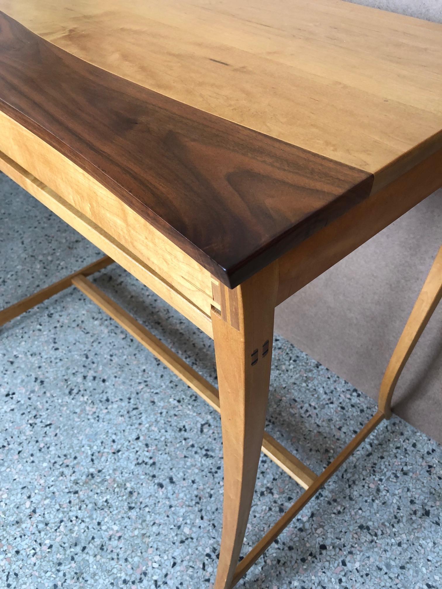 An interesting maple and walnut custom desk/console table with drawer by Byron Robitaille.