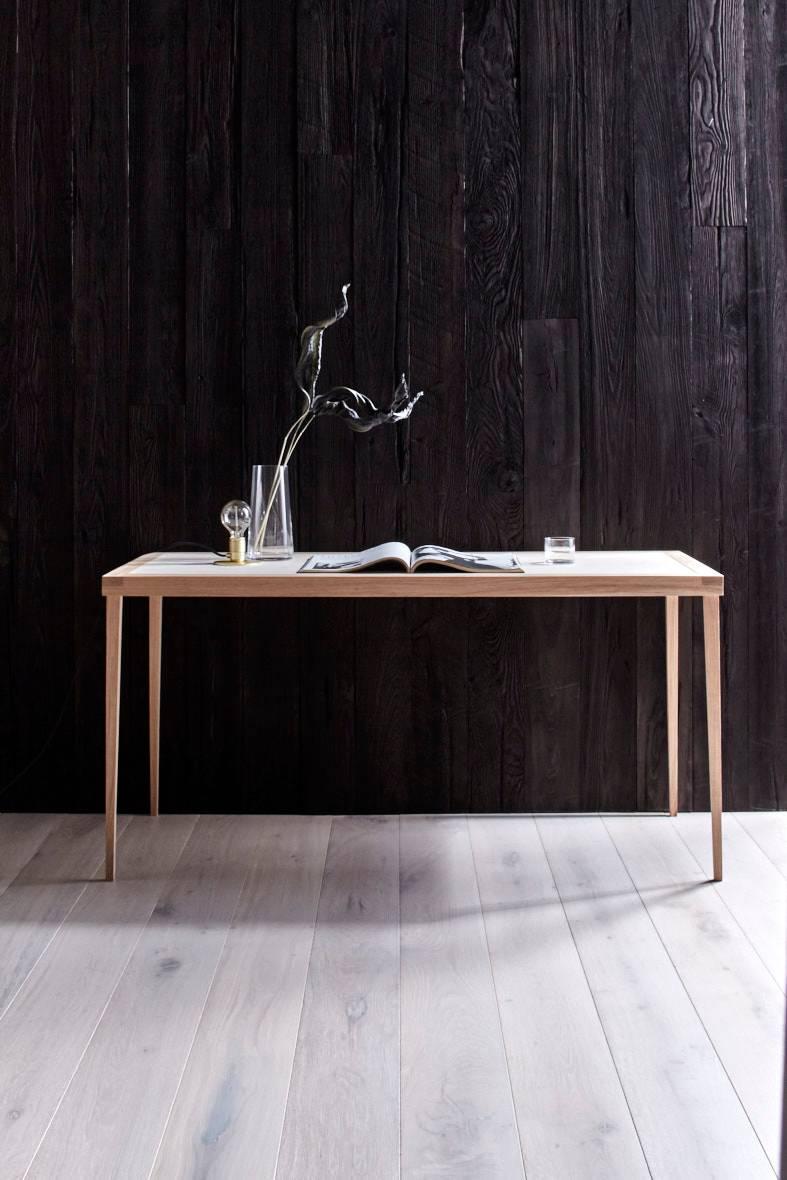 Deborah Ehrlich's simple writing desk is handmade with traditional joinery by an incredibly talented master craftsman in RI.

The delicate proportions are a nod to the elegance of all her work, and it appears to be floating above the floor.

It's