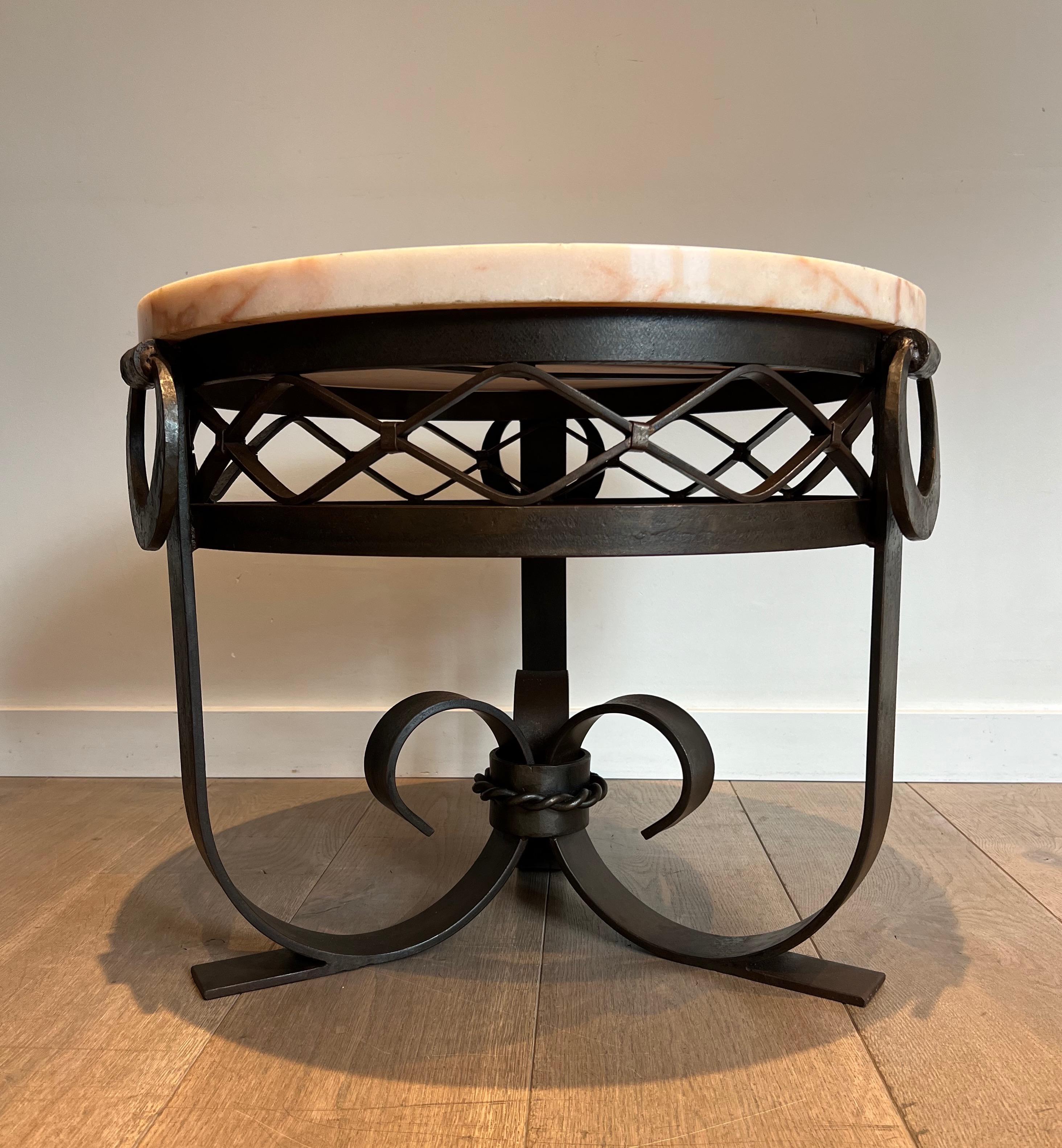 This very nice Gueridon is made of wrought and hammered iron with a thick round white marble top. This is a French Work form the Art Deco period. Circa 1930