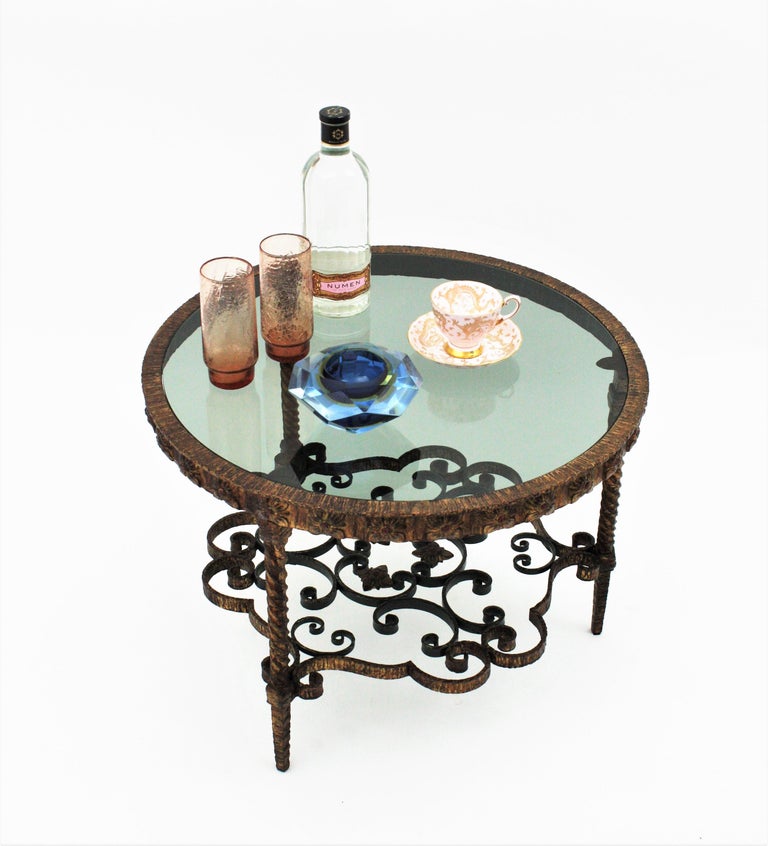Wrought Gilt Iron Smoked Glass Round Coffee Table Twisted Legs And Floral Motif For Sale At 1stdibs