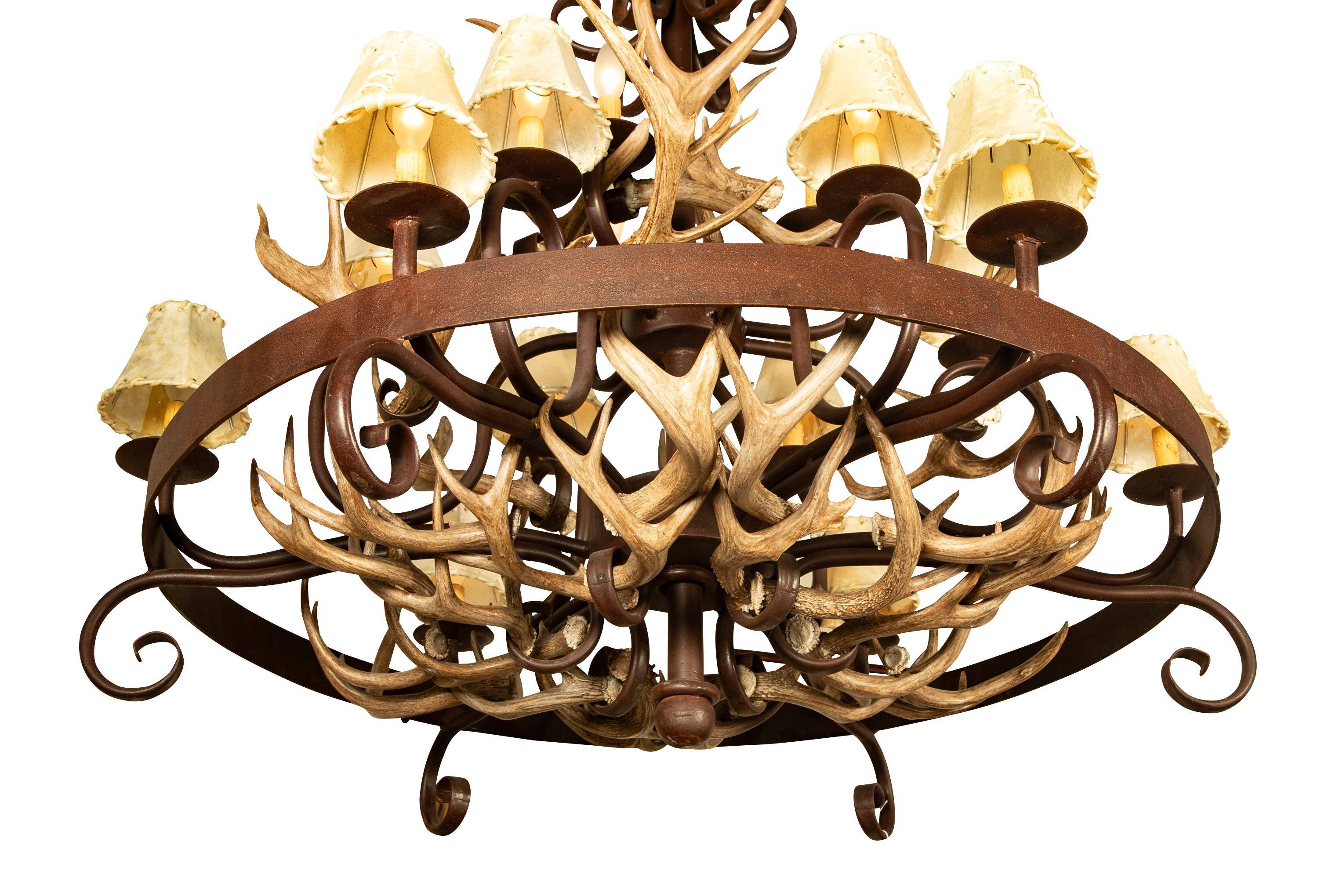 Rustic Wrought Iron and Antler 15 Light Chandelier With Rawhide Shades