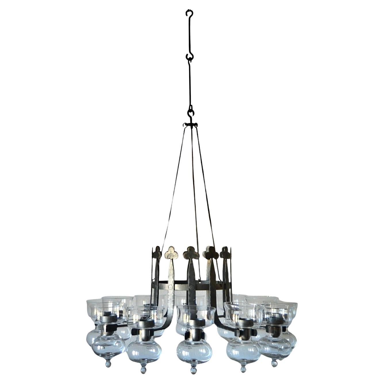 Wrought iron and blown glass chandelier, Bolin Smide, Sweden, 1970's For Sale