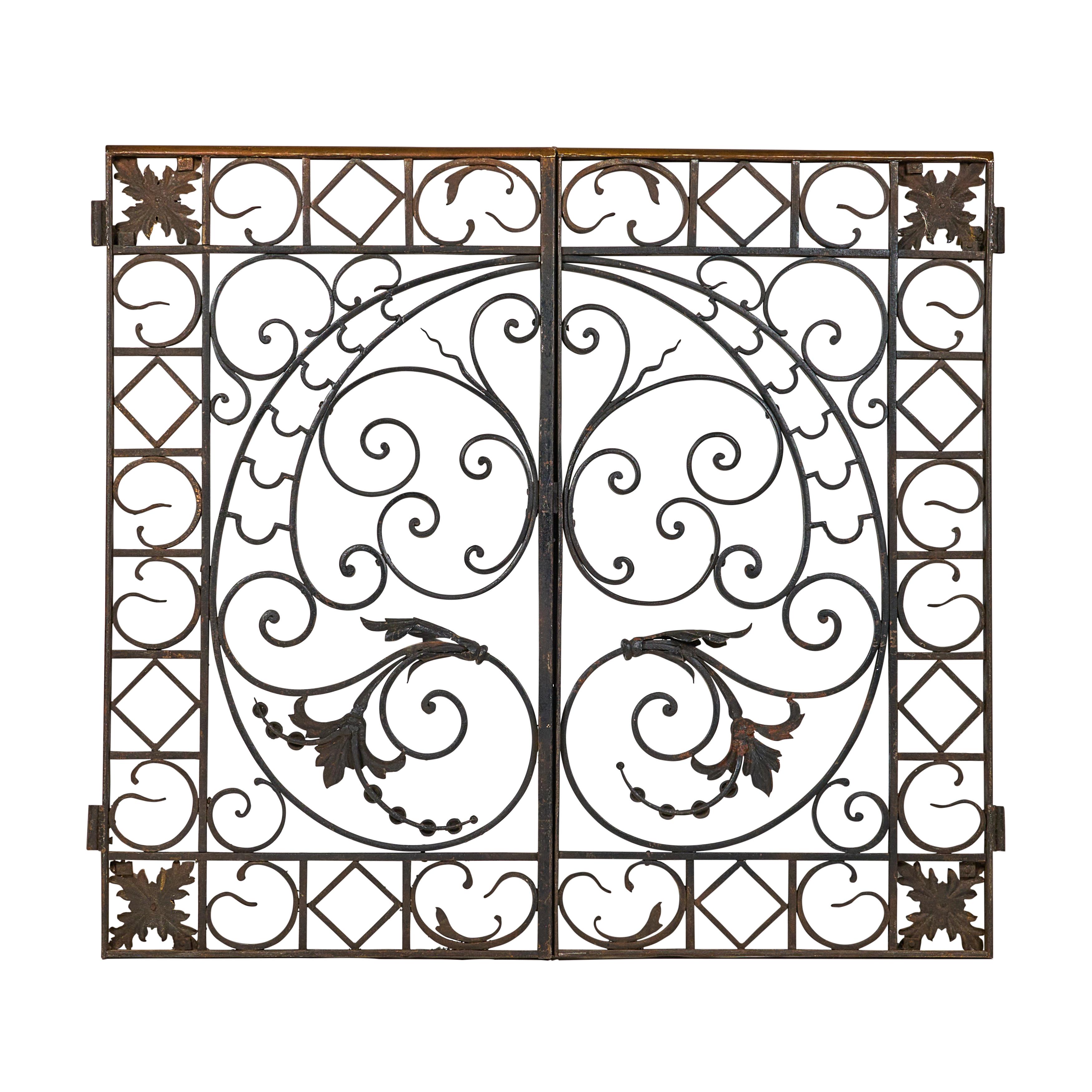 Pair of wrought iron and bronze decorative grills/gates - great quality.