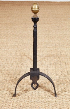 Chenets à cœur percé en fer forgé et bronze