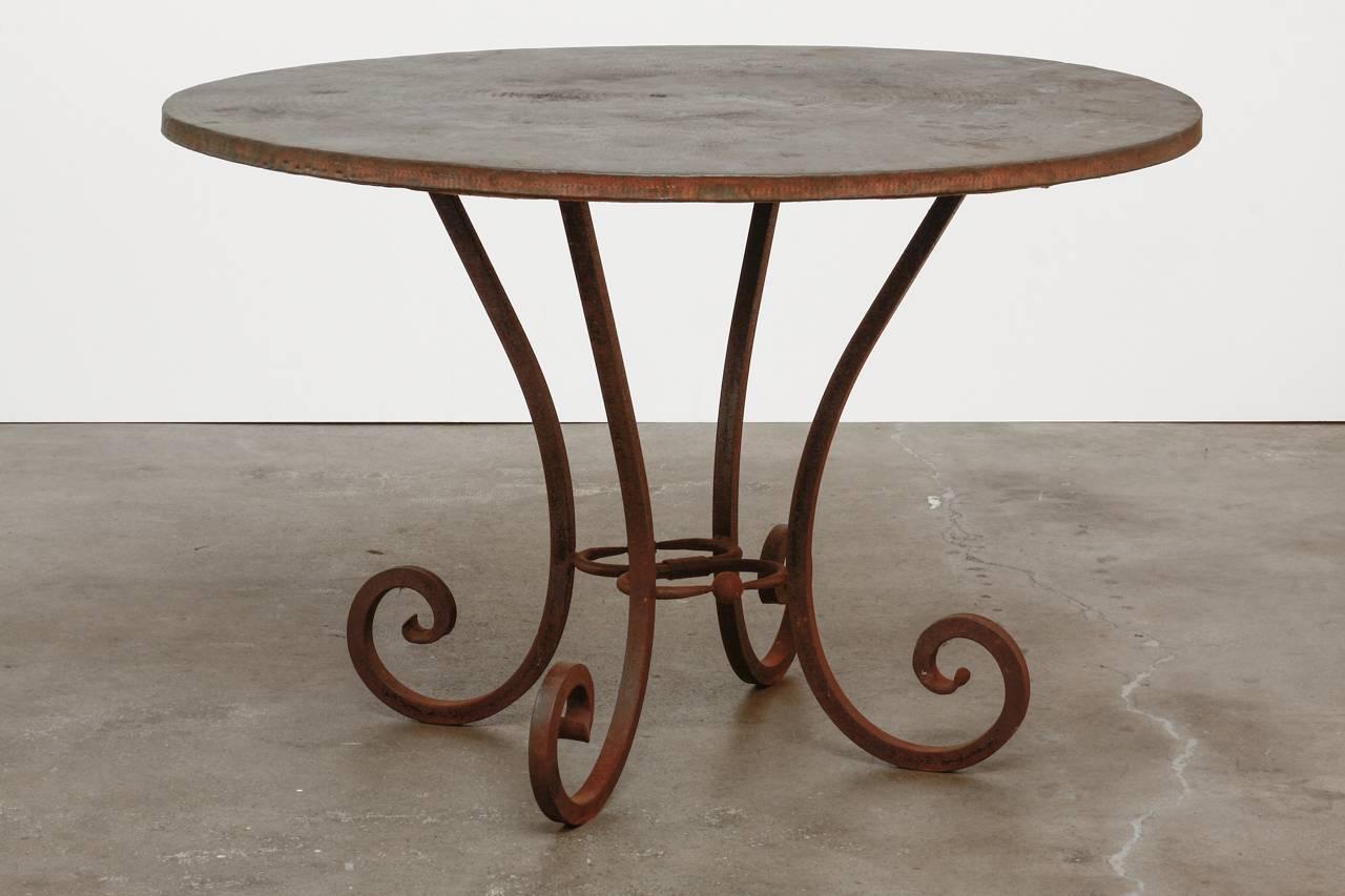20th Century Wrought Iron and Hammered Copper Round Dining Table