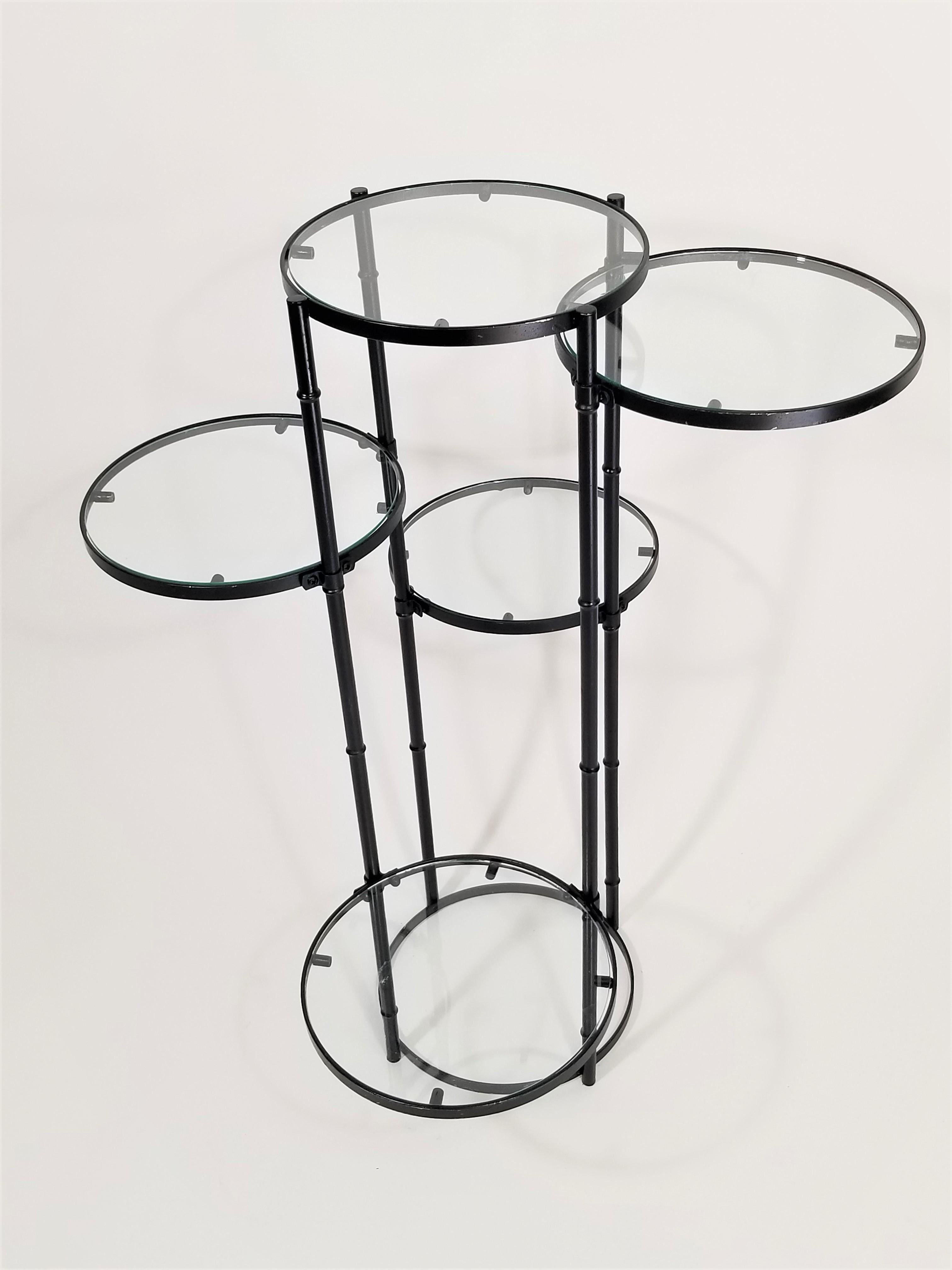 Vintage Art Deco to midcentury era plant or patio stand. 5-tiered. Black wrought iron and round glass shelves or tiers.