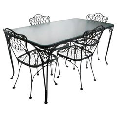 Hierro forjado y cristal  Mesa de comedor de jardín con cuatro sillas Woodard Orleans
