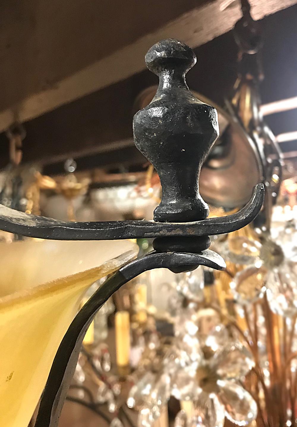 An Italian circa 1940's wrought iron light fixture with glass insets. 

Measurements:
Height: 13