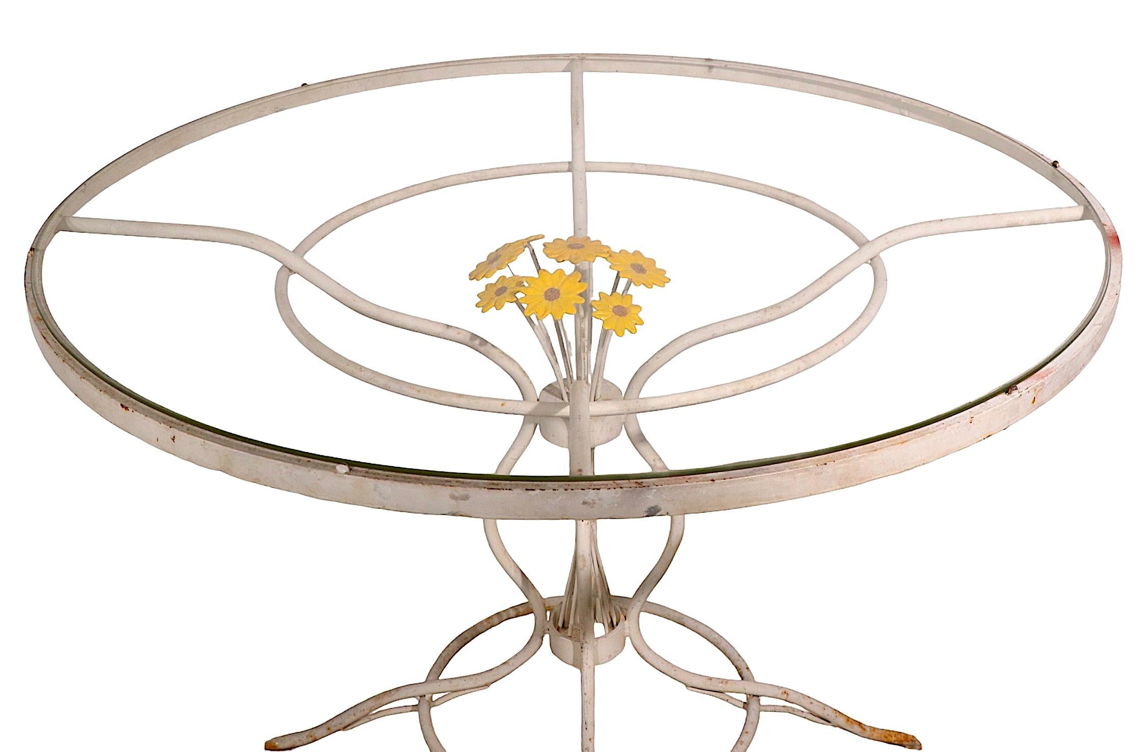 Wrought Iron and Glass Patio Garden Poolside Table with a Bouquet of Daisies For Sale 5