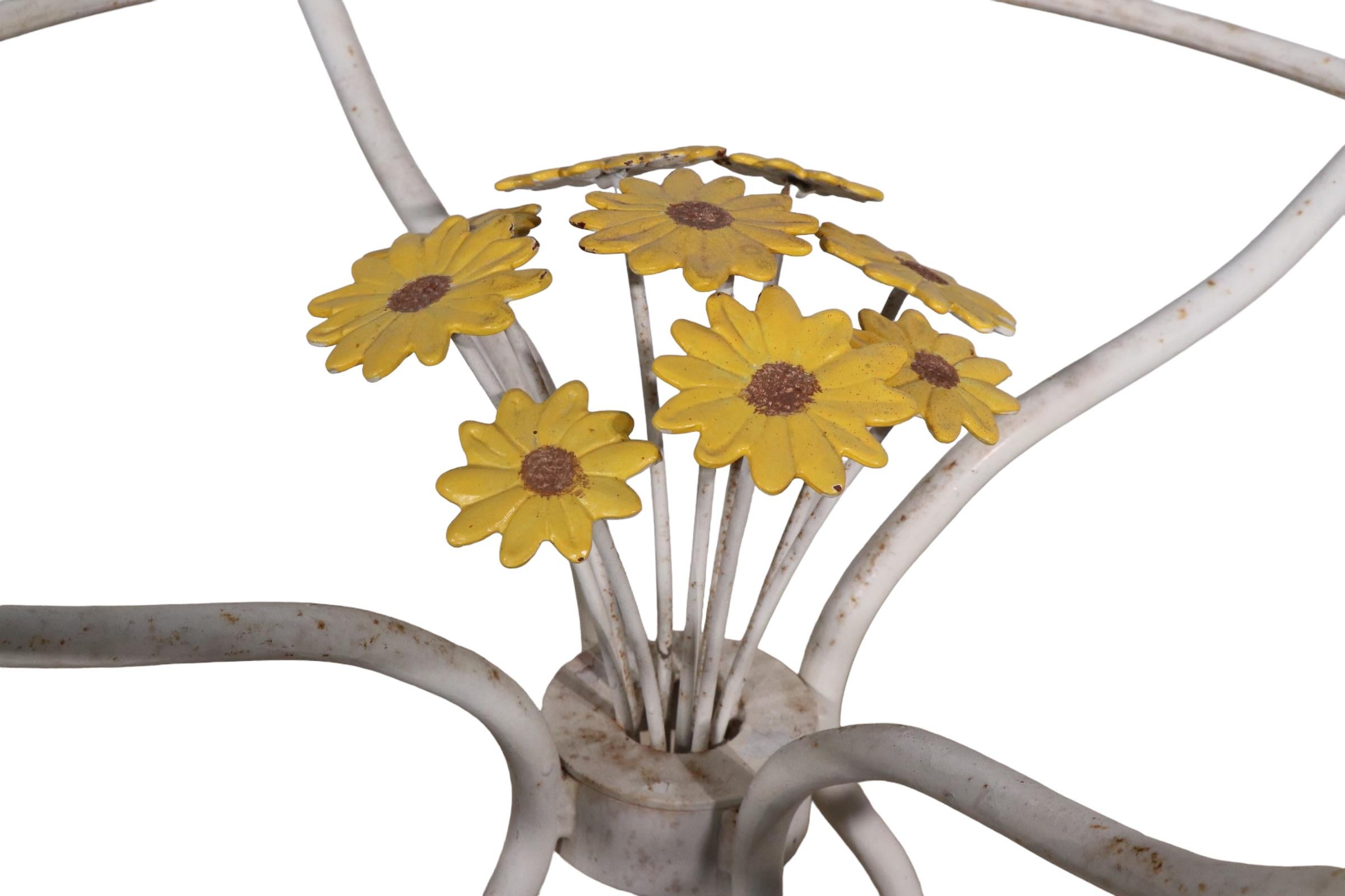 Wrought Iron and Glass Patio Garden Poolside Table with a Bouquet of Daisies For Sale 6