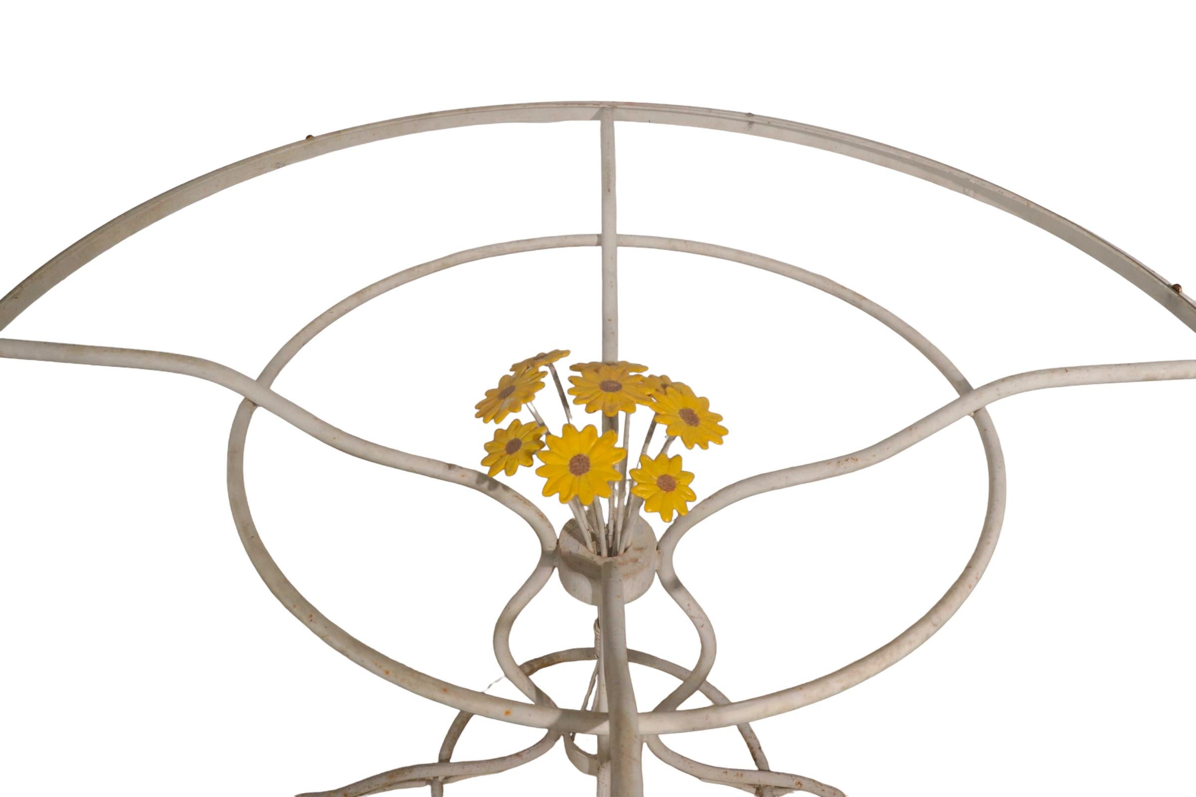 Wrought Iron and Glass Patio Garden Poolside Table with a Bouquet of Daisies For Sale 3