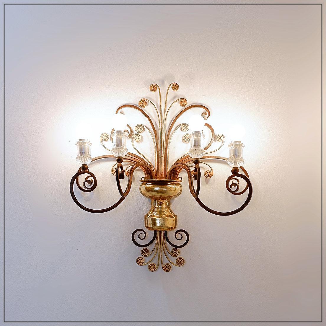 Wrought iron and glass sconce in the style of Maison Baguès
Baguès - Wall Light - France Vintage
Measures : 52x18,5cm H:58cm
Materials : Iron - Glass 
