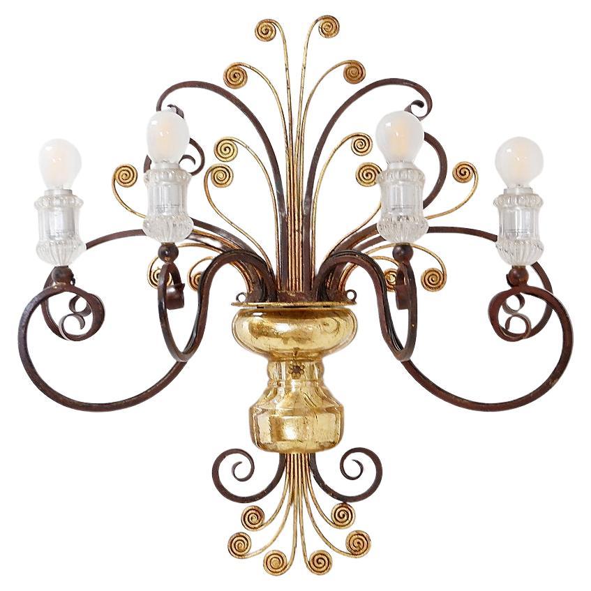 Wrought iron and glass sconce in the style of Maison Baguès im Angebot