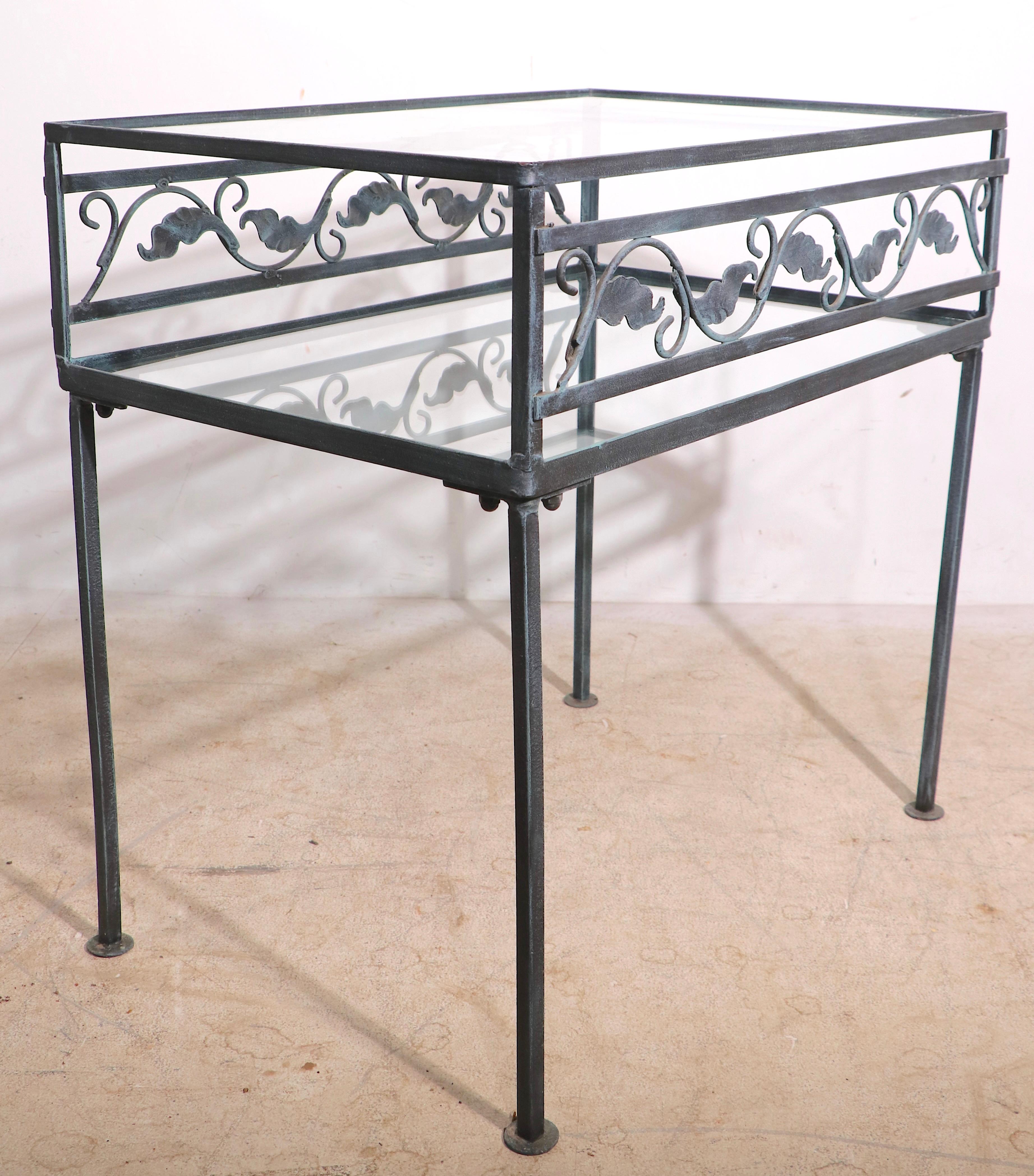 Mid-Century Modern Wrought Iron and Glass Two Tier Garden Patio Table by Meadowcraft For Sale