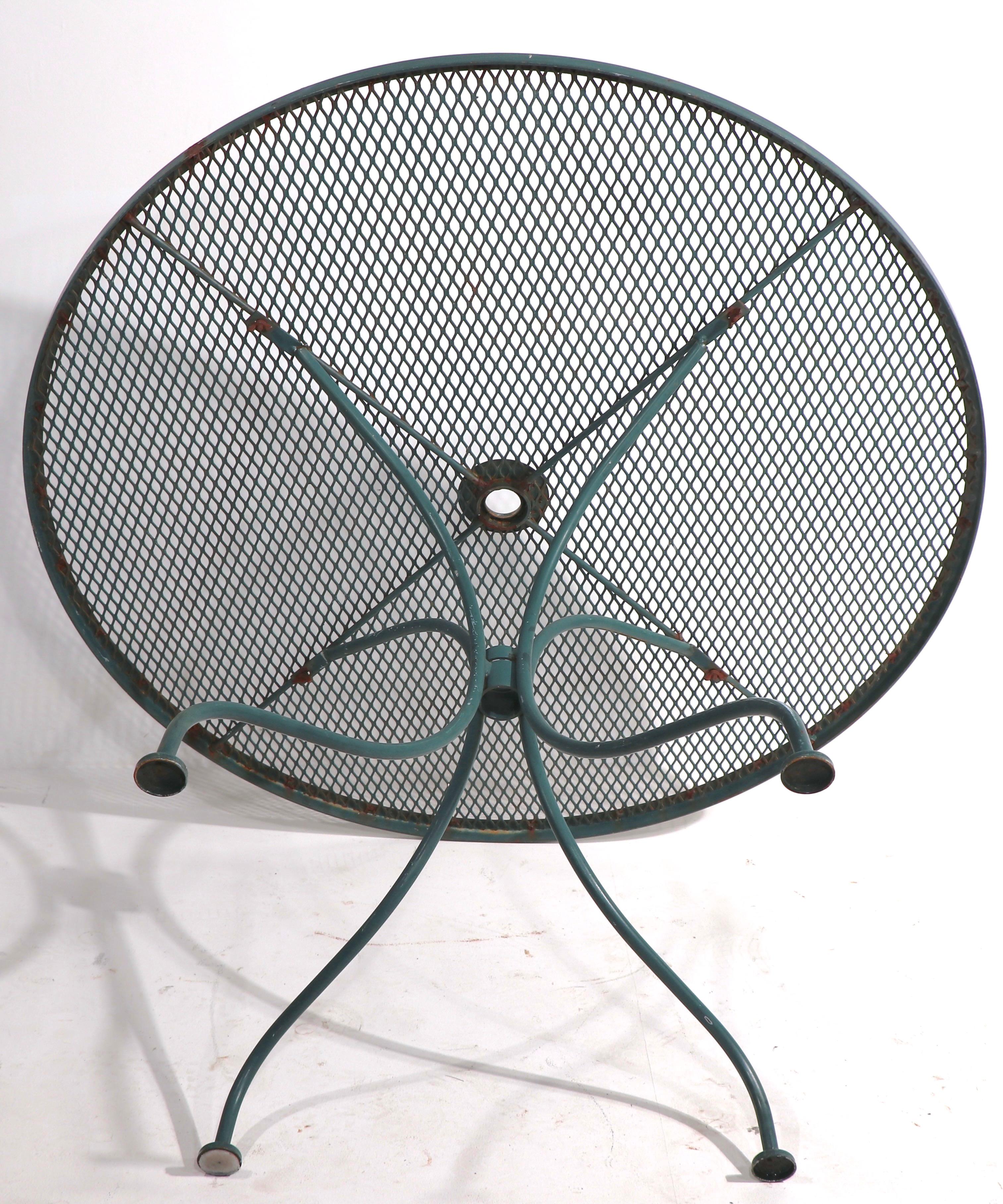 Wrought Iron and Metal Mesh Garden Patio Cafe Dining Table Att. to Woodard In Good Condition In New York, NY
