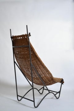 Fauteuil en fer forgé et rotin, années 1950.