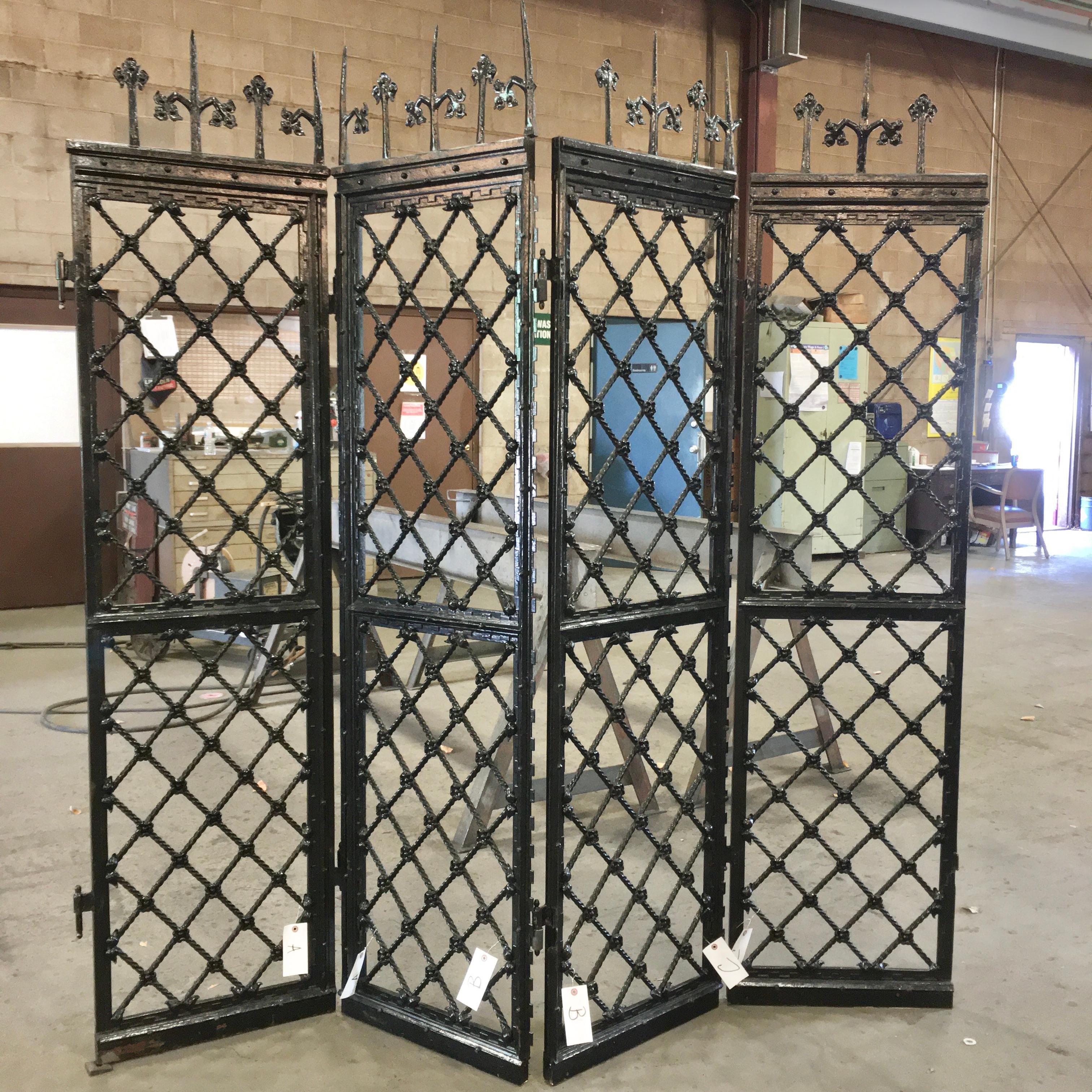 SATURDAY SALE

These early 20th century wrought iron hinged panels or grilles came from the 775 Grove St, Glencoe, IL home of encyclopedia publisher Frank E. Compton.
Each panel weights ~100 pounds, is 74 inches high (84 inches to top of gothic