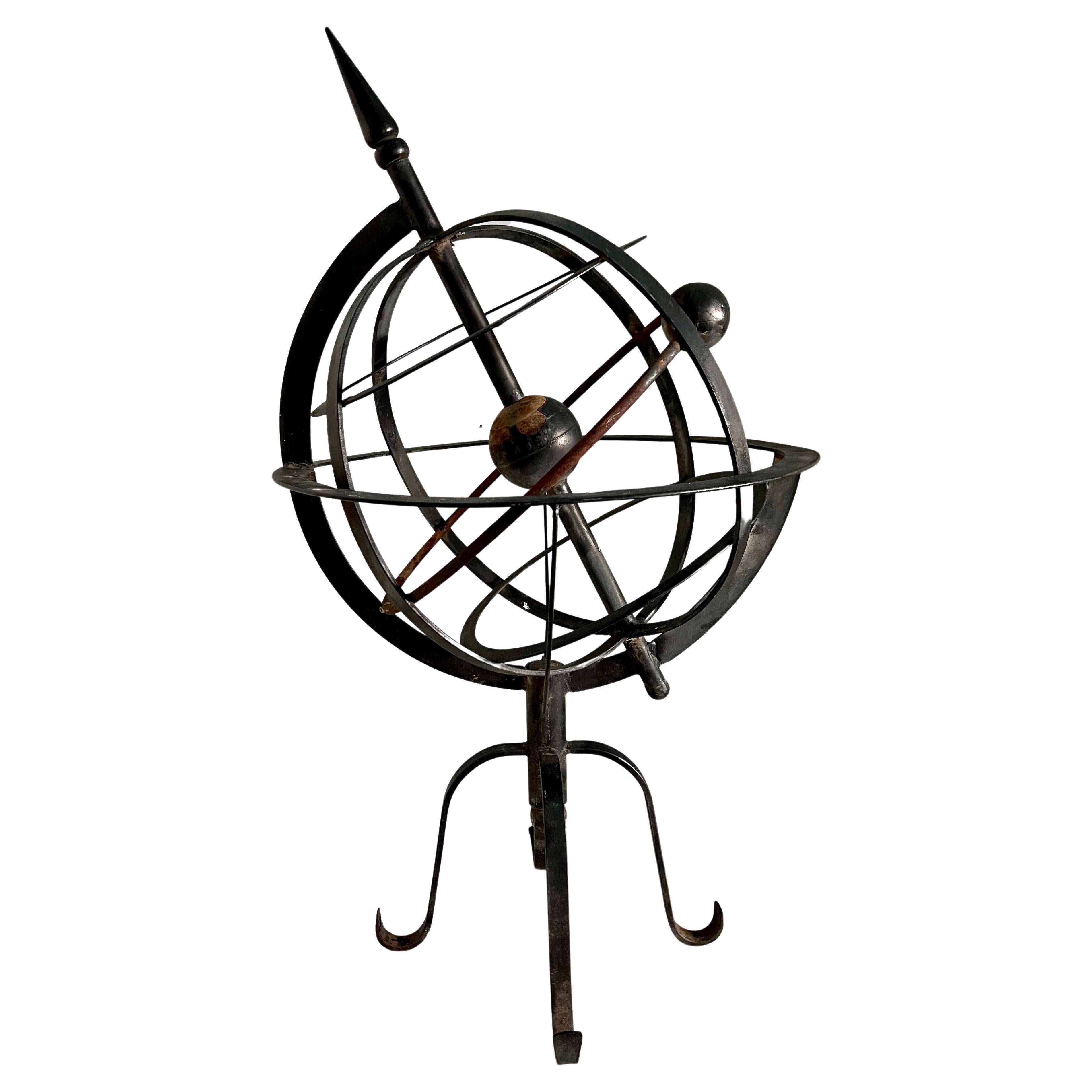 An Armillary is a measurement of the heavens that dates back to the 14th Century. In modern homes, beause they are usually made of wrought iron, they work very nicely in the garden as an architectural element or even in the home as a point of