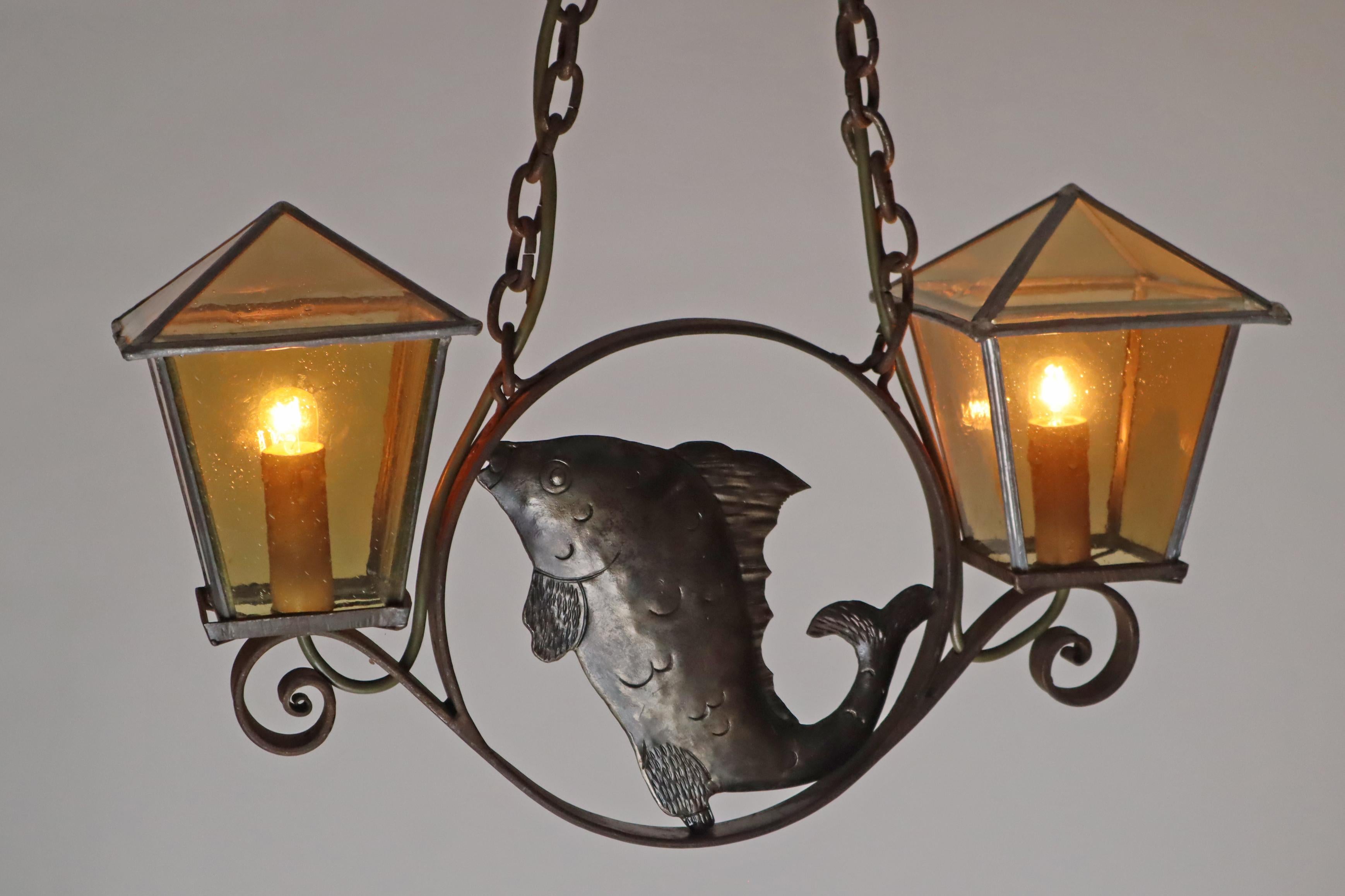 Hammered Wrought iron Art & Craft Pendant Lamp with a Fish and Leaded Glass Germany 1920s For Sale