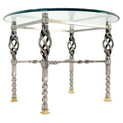 Table basse d'appoint en fer forgé ornée de pieds en laiton et de verre ovale avec plateau en verre 
