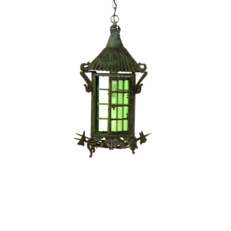 Arts and Crafts Lantern with original verdigris finish. Original mouth blown leaded glass panels with a rippled texture. 
Squared roof panels with a rippled texture. All fittings are handmade, holding panels and elements together. Each side