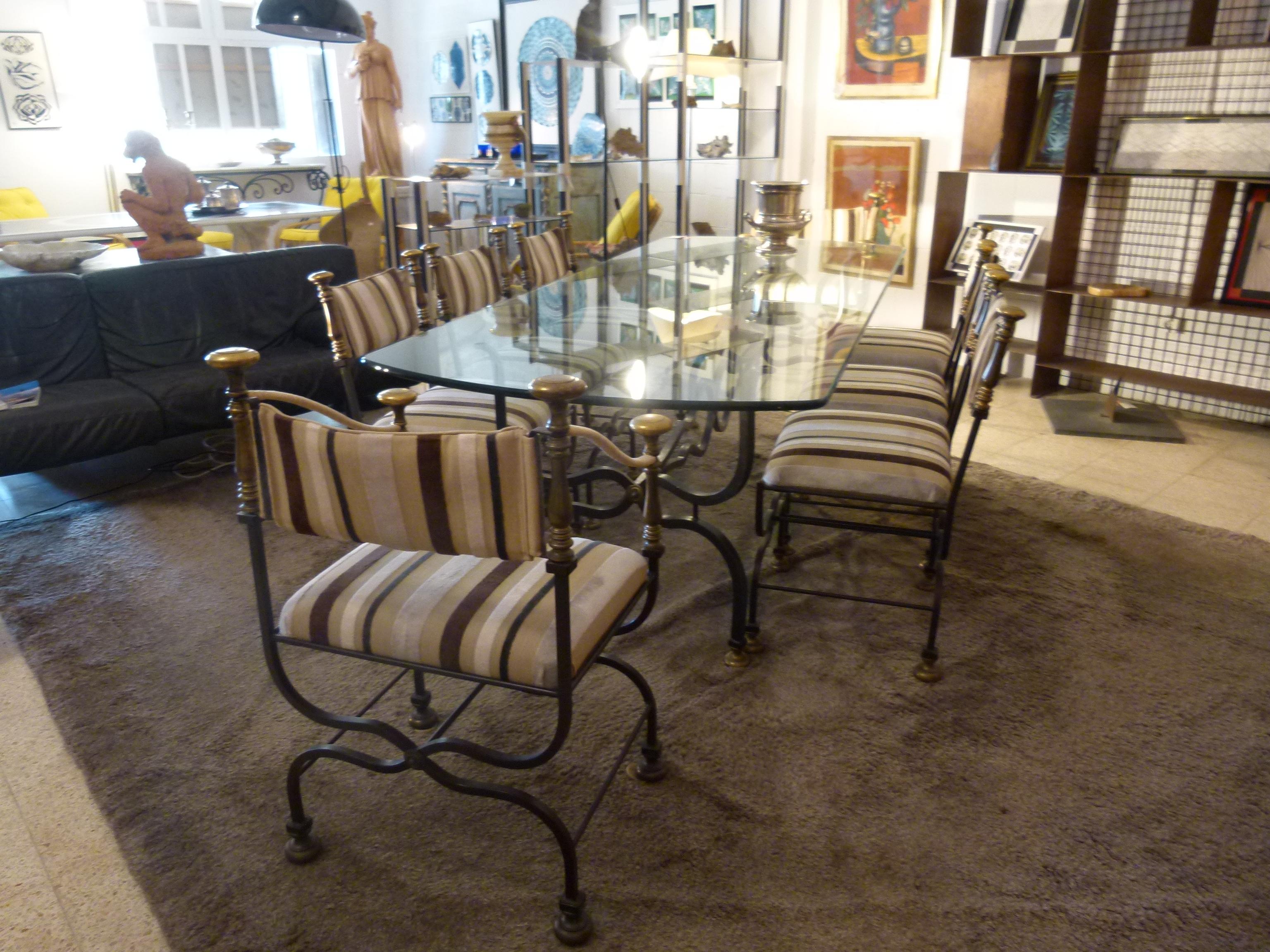 Modern Glass Dining Table with 6 Chairs and 2 Armchairs.