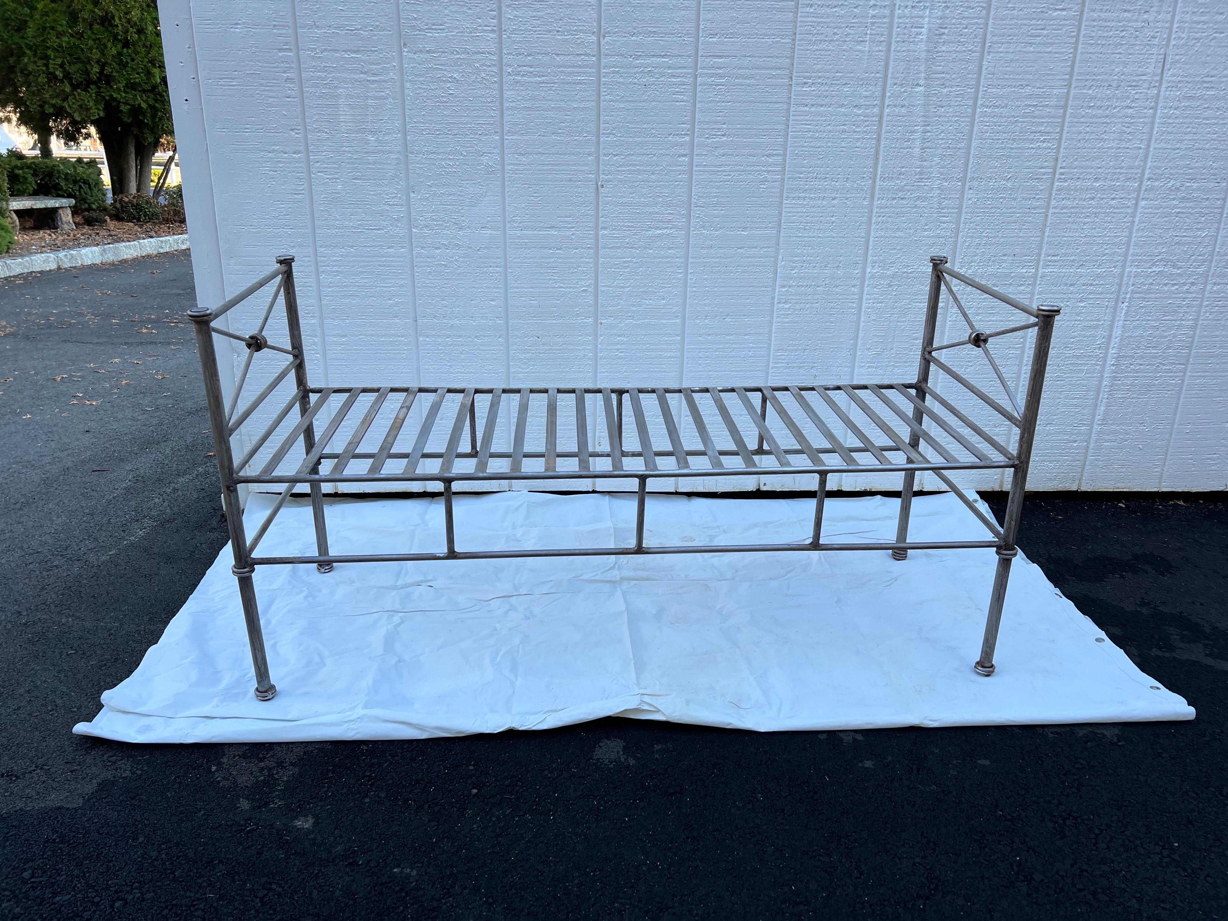 Wrought Iron Bench or Settee in Silver Gray. Classic ,timeless style. Perfect for at the foot of a bed or in an entry way. This can also be used outside in a garden or in a front door stoop.. A cushion could also be used if desired. We have a pair