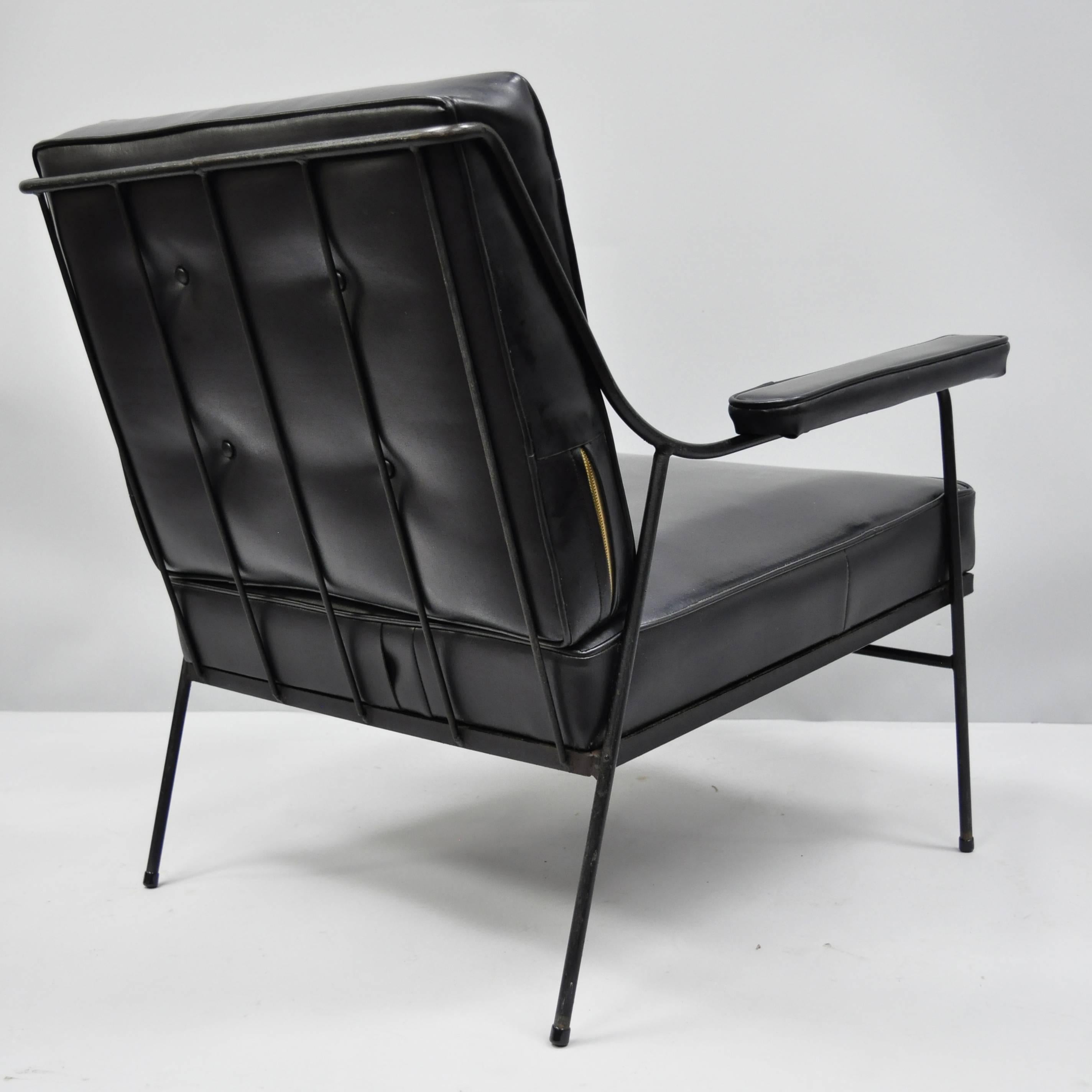 Rare Mid Century Modern Wrought Iron & Black Naugahyde Lounge Chair attributed to Milo Baughman for Pacific Iron Products. Item features button tufted black vinyl cushions, loose back cushion, wrought iron construction, upholstered armrests, quality