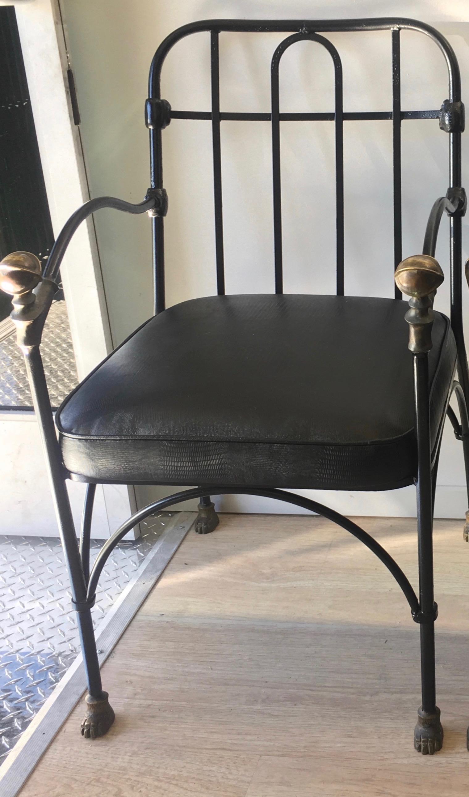 Wrought iron chair with bronze lion head detail - currently available as a pair on the site, we will sell individually per popular demand. Our other chair has a ball detail rather than lion... images are mixed to show both. A handsome chair freshly
