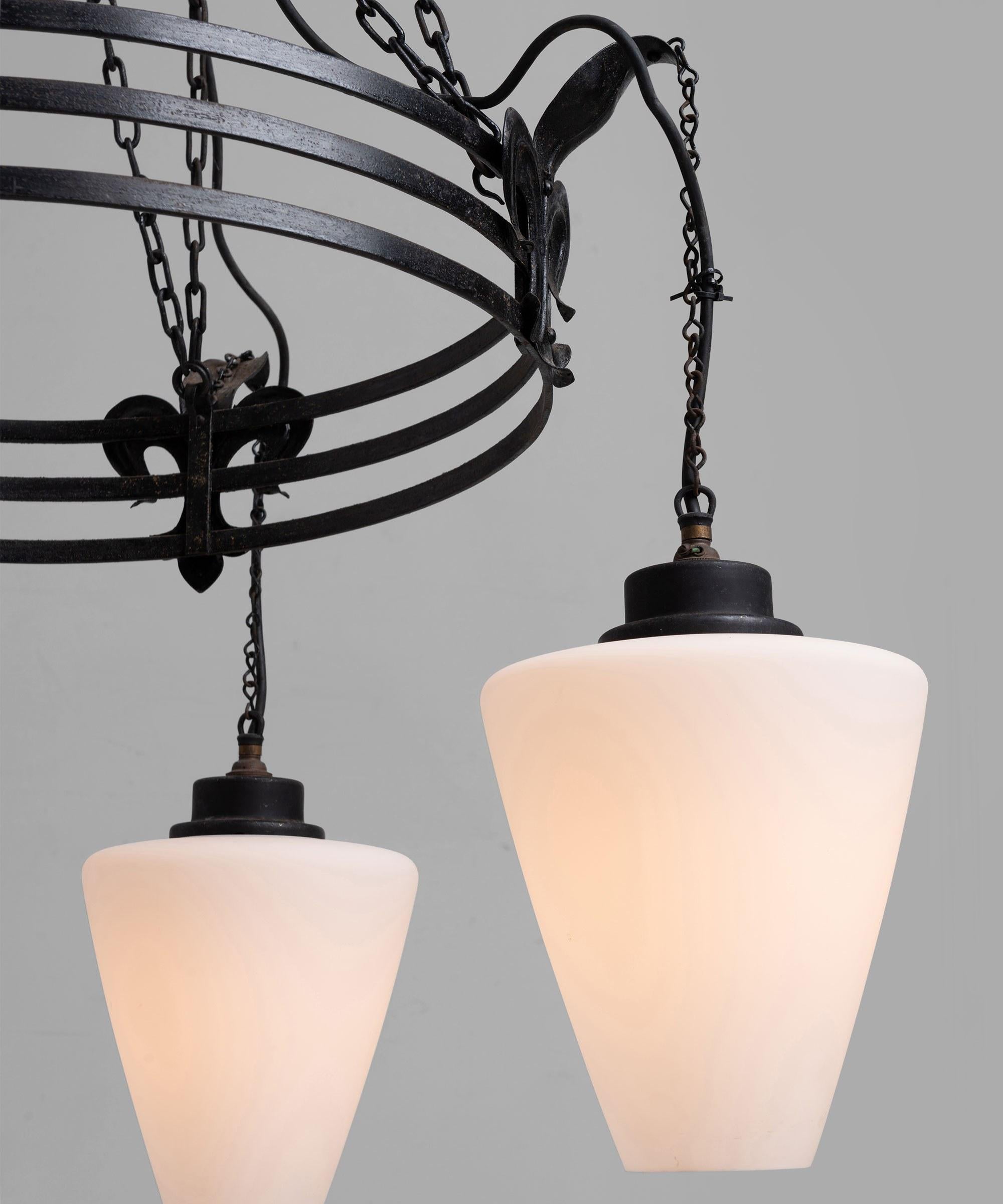 4 Opaline glass shades, with original hooks and chains.


Measures: 30.5” diameter x 61.5” height.

