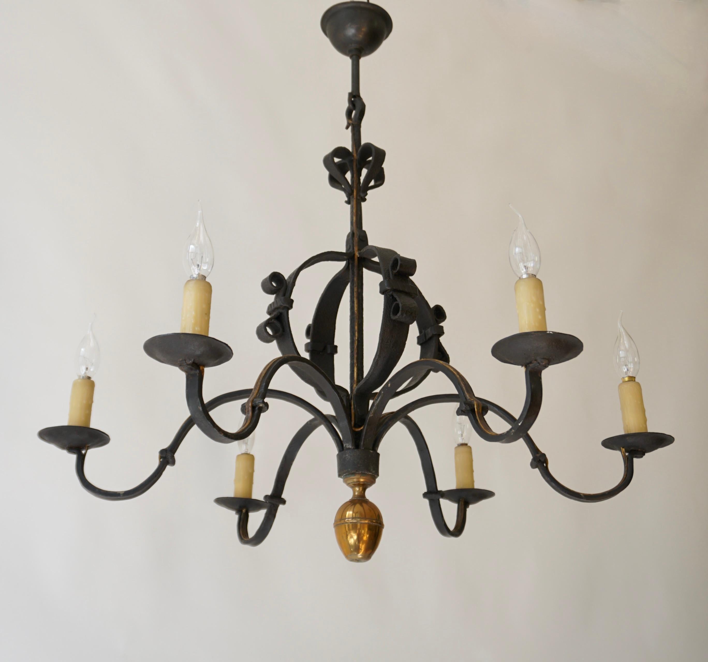 French wrought iron chandelier has six candelabra arms. This chandeliers would work beautiful over a pool table, kitchen island, dining table, bar, or entrance hall. 


Diameter 33.4