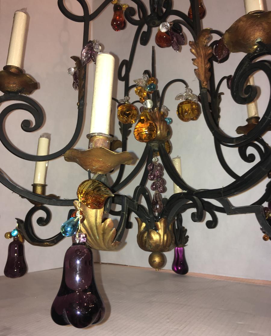 black wrought iron chandelier with crystals