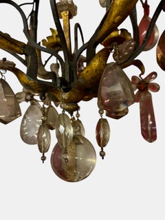 Wrought iron chandelier with somptuous crystal
