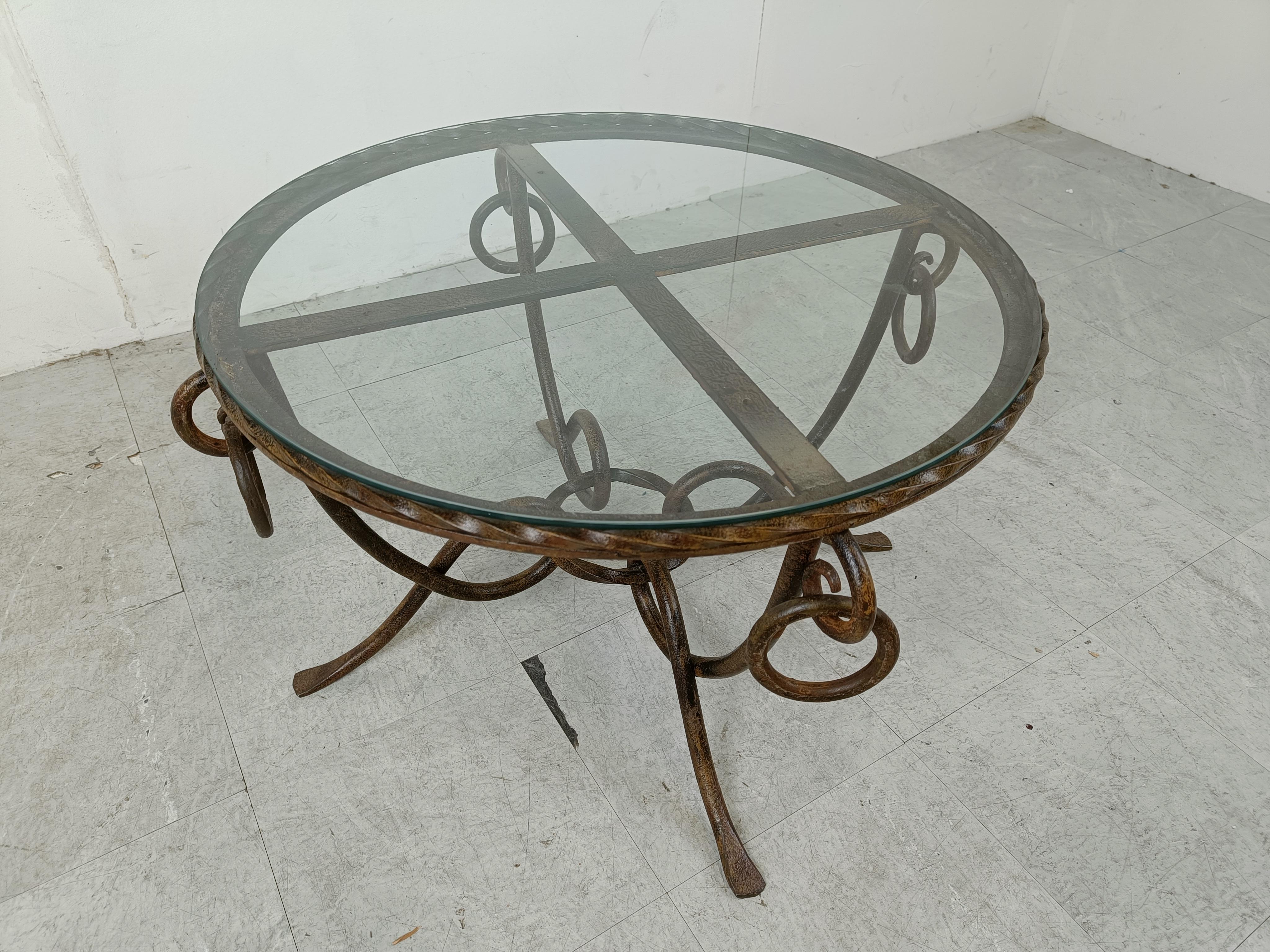 Glass Wrought iron coffee table by René Drouet For Sale